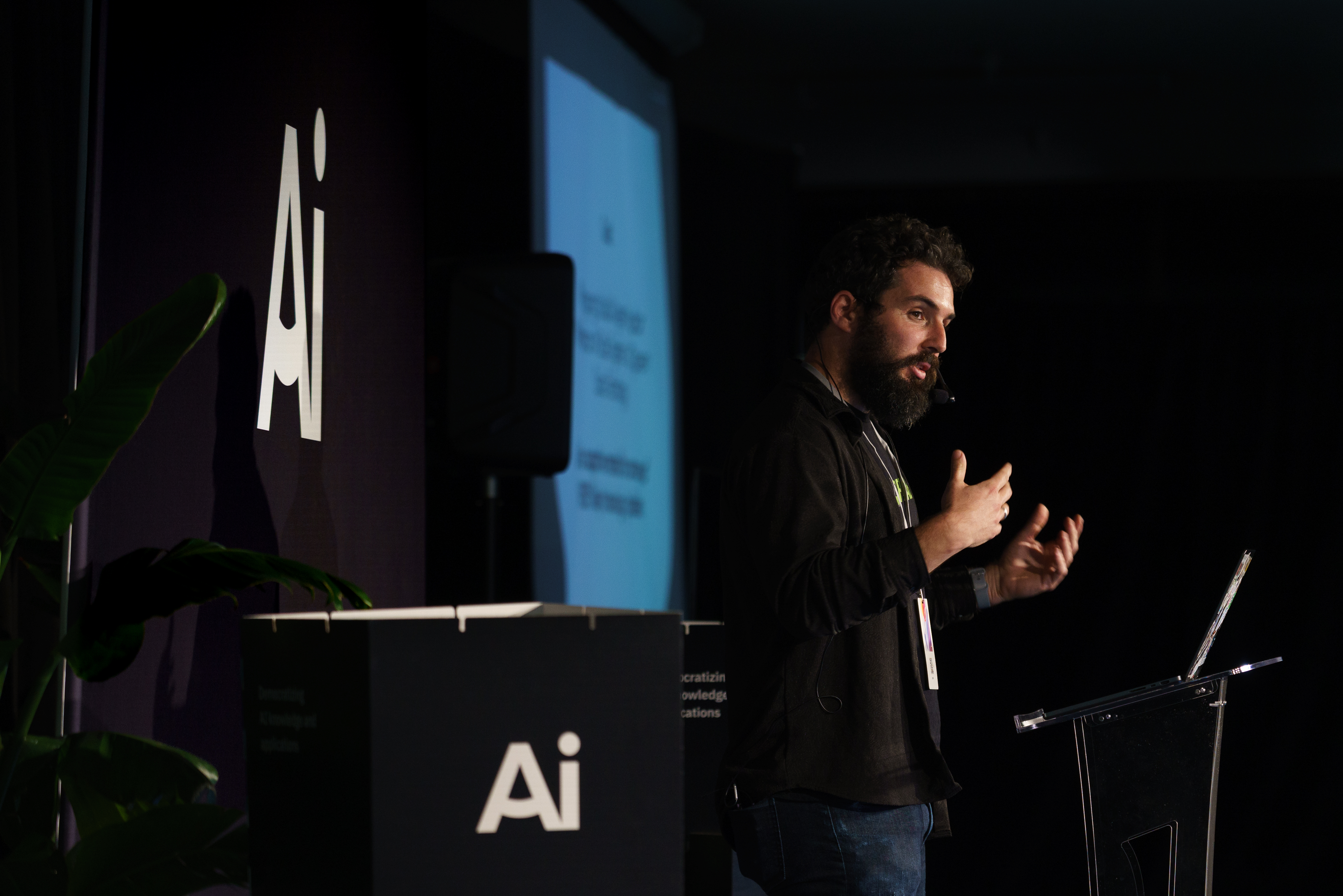 Andor speaking on stage